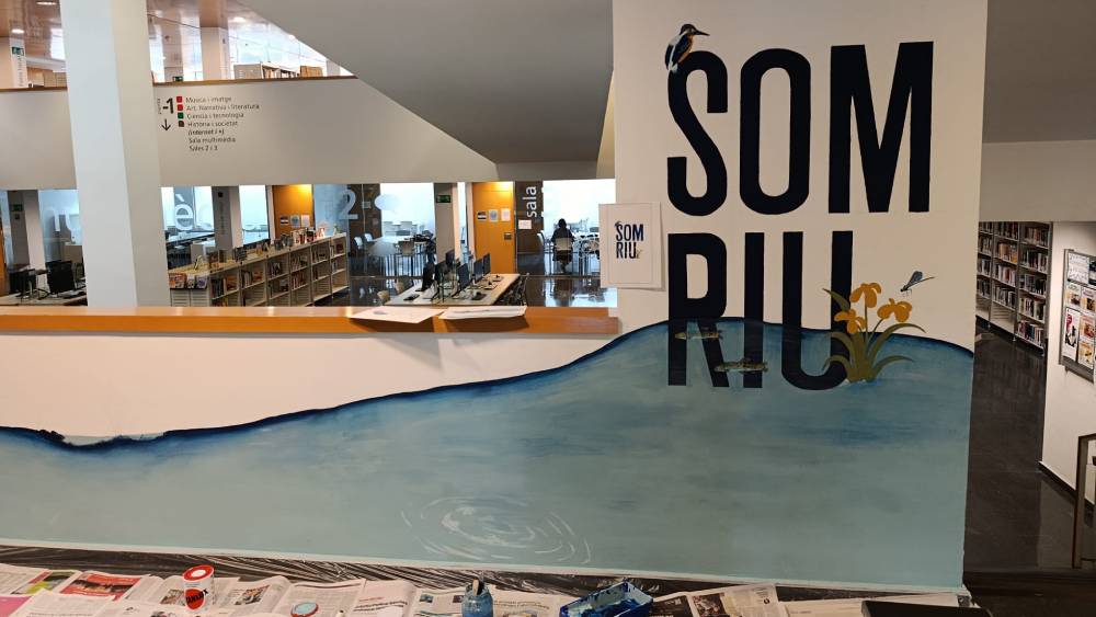 El mural somRIU en procés de creació El mural somRIU en procés de creació